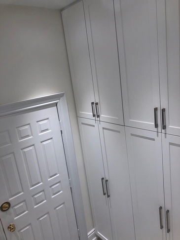 Laundry Room Closet - Custom Cabinets Oakville by Parsons Interiors Ltd.