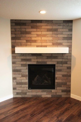 Basement Fireplace Renovation by Affordable Basement Renovations Ltd - Calgary Basement Renovation Contractors