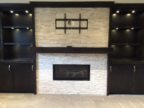 Modern Basement Fireplace Renovation Calgary by Affordable Basement Renovations Ltd