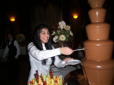 Girl Standing near Chocolate Fountain