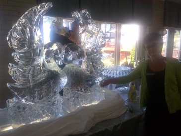 Swan Ice Sculpture for Wedding by Festive Ice Sculptures