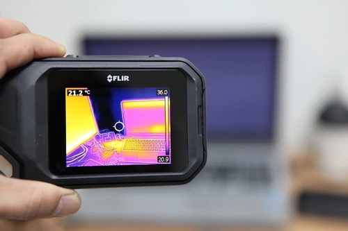 A thermal camera focusing on a laptop.