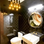 wallpaper_wall_muralswallpaper_in_the_powder_room_in_the_House_of_Lucite._ComplimentDesign.comLighting_hung_by_t