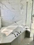 Corner Bathtub - Bathroom Renovations Hanmer by INTERIORS by NICOLE