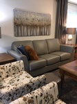 Living Room With Grey Leather Sofa - Interior Decorating Services Greater Sudbury ON by INTERIORS by NICOLE