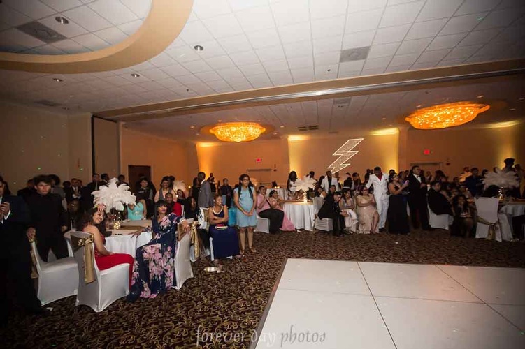 Formal attire with bow ties and corsages for prom attendees organized by Houston Event Planning