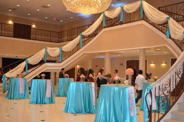 Quinceañera reception hall with elegant decorations and lighting done by Houston Event Planning