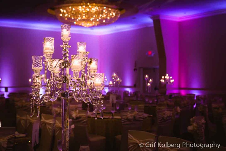 Wedding reception venue with large chandeliers and scenic views done by Houston Event Planning