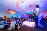 keynote speaker delivering a presentation at a Corporate Event organized by Houston Event Planning