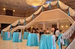 Quinceañera reception hall with elegant decorations and lighting done by Houston Event Planning