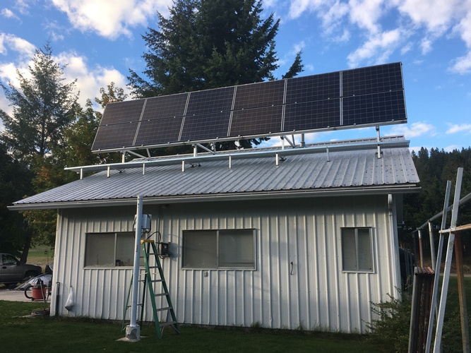 Custom off grid roof mount with integrated walkway.