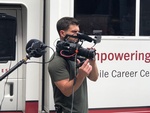 Candid shot of a Merlin Productions LLC Videographer