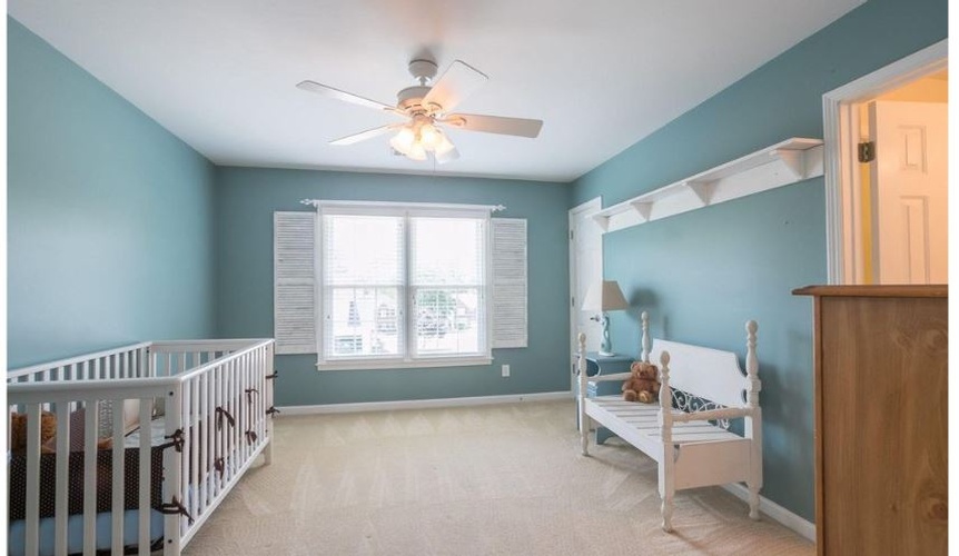 Kids Room with a Chandelier Fan and a Sofa -Interior Decorator Athens at Sage Key Interiors