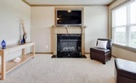 Room with a Fireplace and Carpet Flooring - Home Staging Hamilton by Sage Key Interiors