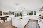 Bright White Kitchen by PB Construction - Custom Home Builder Austin