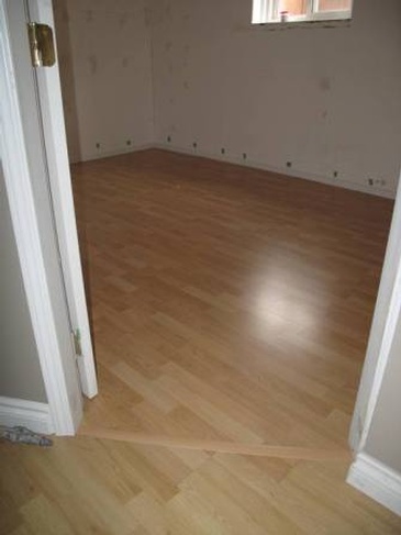 Laminate Flooring Installation Services Coquitlam by Best Handy Hubby Renovation and Painting Services