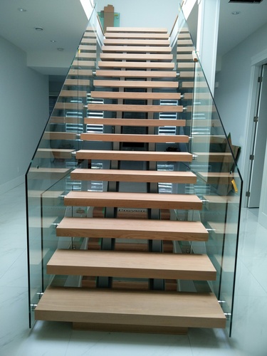 Staircase with Tempered Glass by TJL Floor And Garage Door Inc - Flooring Contractor Vancouver