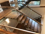 Floating Wooden Staircase by Flooring Contractor Vancouver at TJL Floor And Garage Door Inc