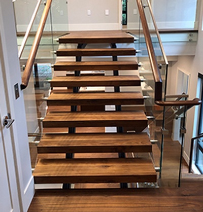 Modern Laminated Stairs by Flooring Contractor Richmond at TJL Floor And Garage Door Inc