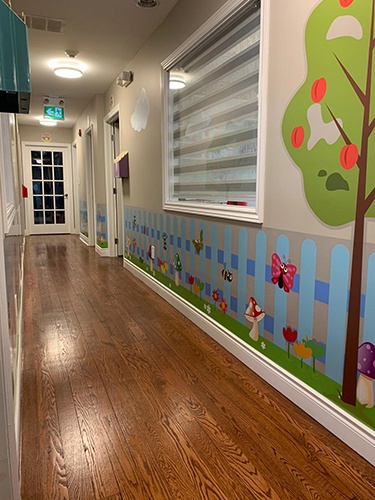 Colorful hallway at HIDE ‘n' SEEK DAYCARE - Licensed Childcare Center in Brampton, ON