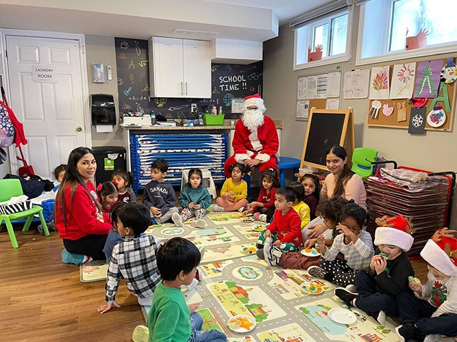 Santa with all the kids at HIDE ‘n' SEEK DAYCARE - Day Care Center in Brampton, Ontario