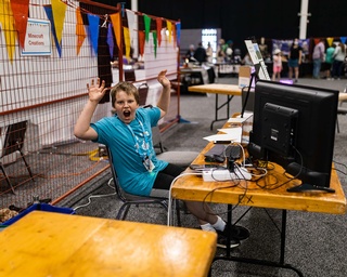 A photo taken of a child enjoying the event captured by Darkstrand Visuals