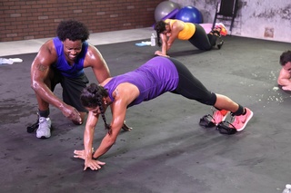 Inspiring fitness trainer Isaure Moorehead demonstrates her toned and strong core in a professional photoshoot