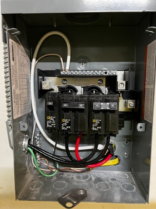 Installing a main service panel with better surge protection to safeguard electronics