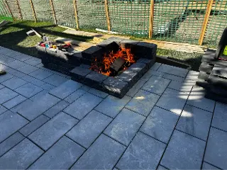 Green Crew Contracting Inc offer Outdoor Firepit construction for elegant look