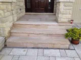 Flagstone Stair Case Installation by Green Crew Contracting Inc for elegant look