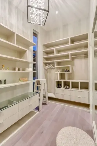 Tailored Closet Space for Your Storage Needs at Leyland Drive, a Custom Home in West Vancouver by Noura Homes