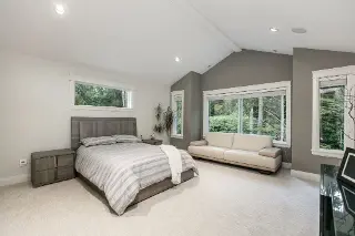 Escape to the serene Robson Custom Home, a modern oasis in the lush embrace of West Coast forests