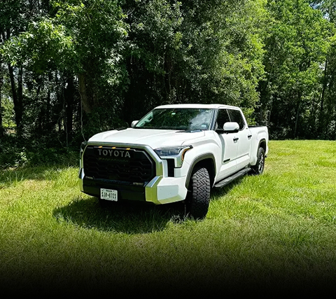 Discover the allure of custom Toyota vehicles in this captivating photo, captured by Texas Truck Works