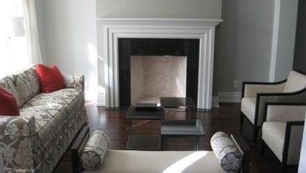 Modern living room with fireplace representing fireplace installation services in Etobicoke, Toronto and Mississauga