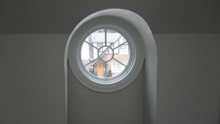 Round architectural window detail representing new home construction, renovation services in Etobicoke, Toronto, Mississauga