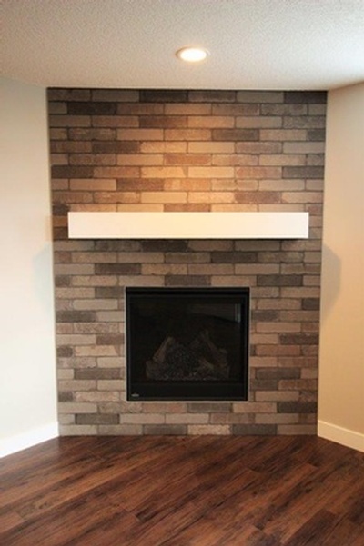 Hearth - Basement Fireplace Renovation Calgary by Affordable Basement Renovations Ltd.