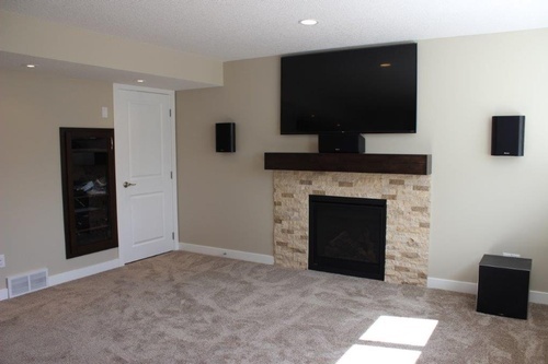 Fireplace Basement Renovation by Affordable Basement Renovations Ltd - Basement Renovation Company Calgary