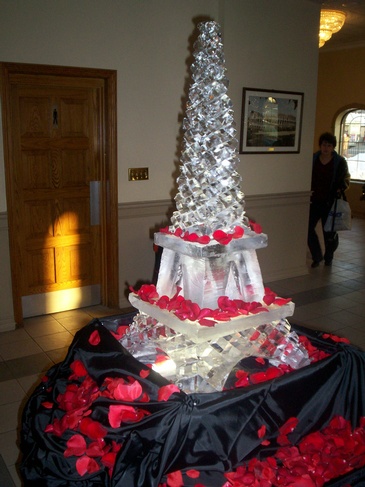 Eiffel Tower Ice Sculpture with Rose Petals by Festive Ice Sculptures