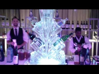 5 bottle chiller display ice sculpture at crown plaza hotel