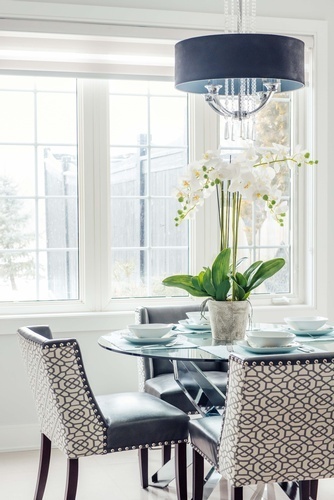 White Flower Vase on Dining Table - Kitchen Renovations Whitby by Royal Interior Design Ltd