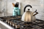 Tea Kettle on Gas Stove - Stouffville Kitchen Renovations by Royal Interior Design Ltd