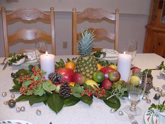 Table Consisting Fruits and Candle - Holiday Home Decorating Services Bedford by Tout Le Monde Interiors