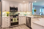Modern Kitchen with White Cabinets - Kitchen Remodeling Services Brookline by Tout Le Monde Interiors
