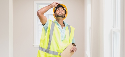 A home inspector inspecting a modern property