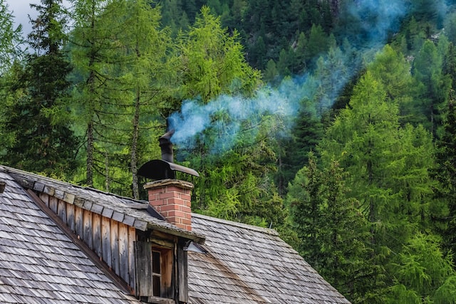 Smoke coming out of the chimney.