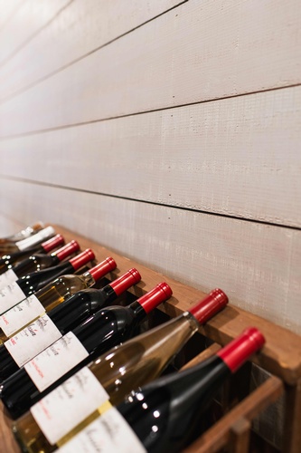 Wine Bottles on Rack - Interior Design Services by Citron Design Group - Long Beach Interior Designers