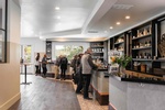 Customers Standing Near Counter - Masia Winery Interior Design Long Beach by Citron Design Group