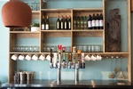 Wine Rack in Seabirds Kitchen - Interior Design Services by Commercial Interior Design Firm in Long Beach