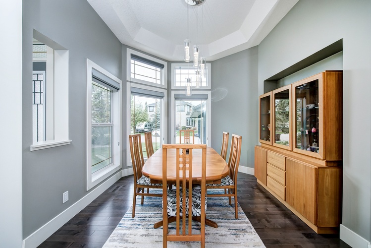 THIS ROOM GAINS A DINING ROOM CHARACTER WITH ADDING A TRAY CEILING.  