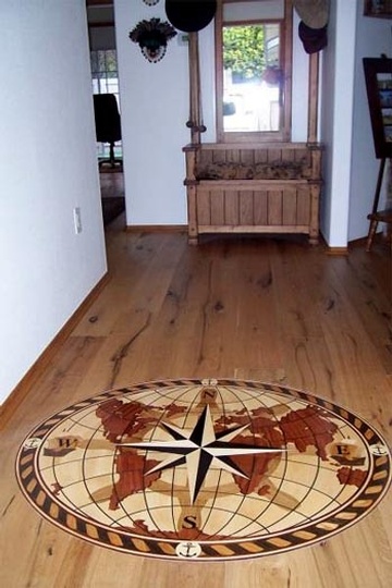 Hardwood Floor Installation with Globe Shape Medallion Dearborn - Al Havner and Sons Hardwood Flooring